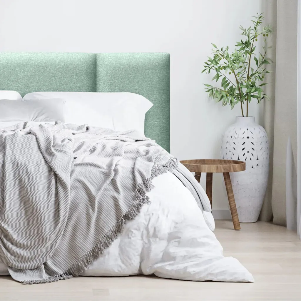 Respaldo de Cama Block tapizado en lino color verde jeans de Espacio Hogar.